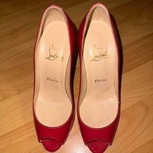 Christian Louboutin fuchsia pink wavy heels